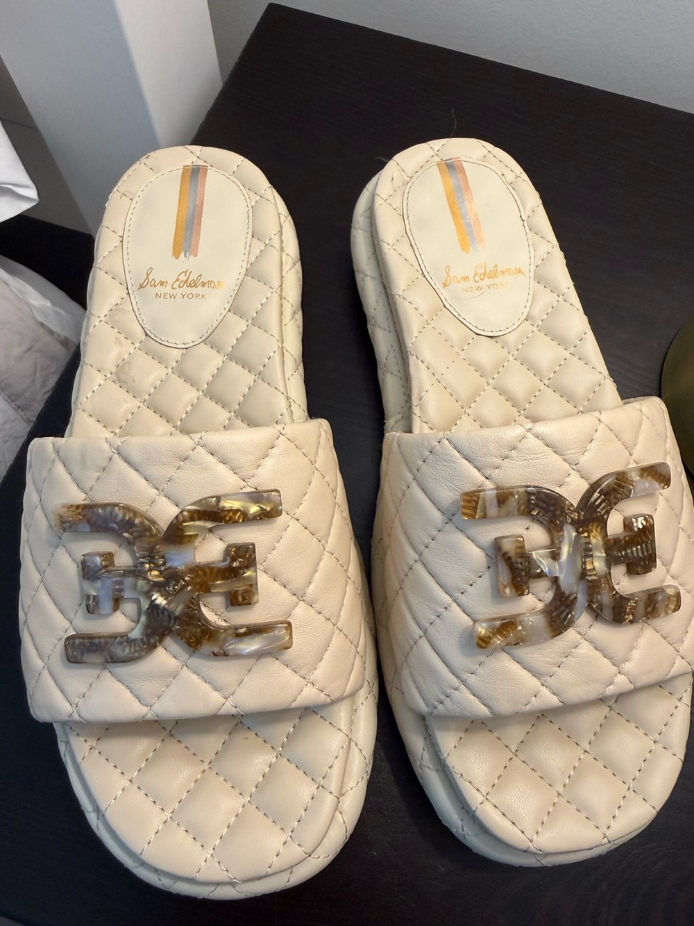 Sam Edelman Quilted Cream Slide Mules with Tortoiseshell Logo Accent